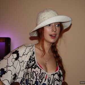 At Ola's home. She made ph.